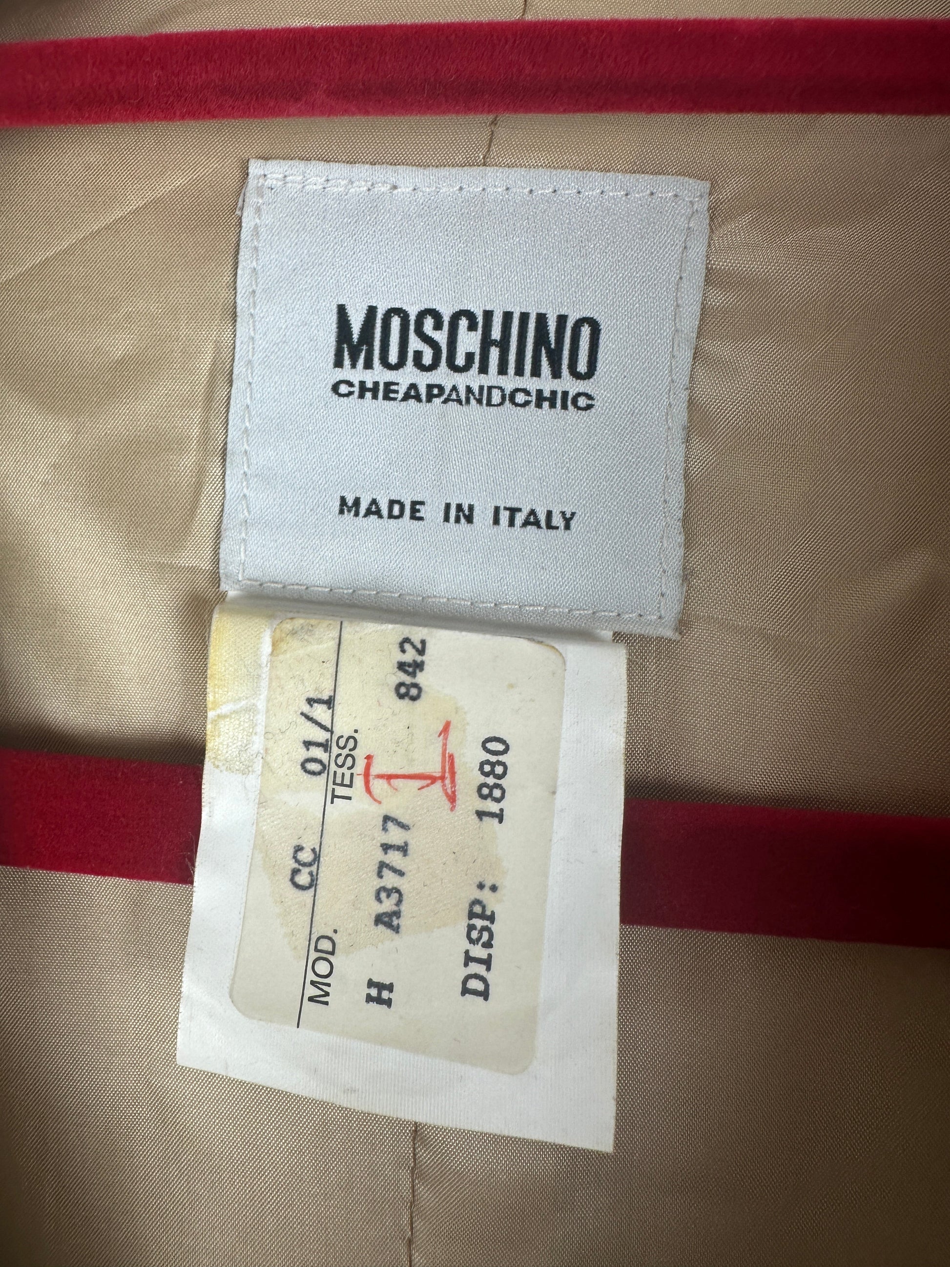 https://cdn.shopify.com/s/files/1/0900/2729/5066/files/Moschino_Studded_Leather_Jacket_Label.jpg?v=1774115112