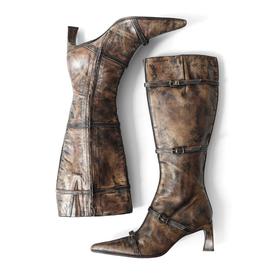 https://images.squarespace-cdn.com/content/v1/673cad159307f210013ba2f7/febd8a8e-2cb5-4325-b36a-c0eac1bfc88b/Muxart_2000s_DistressedLeatherKneeBoots_1.jpg