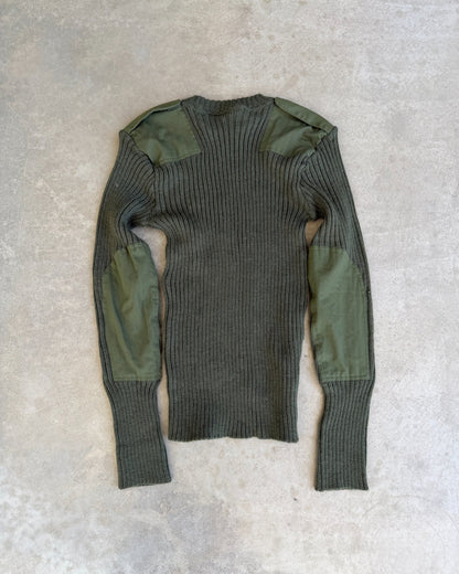 RAF Military Green Knit Sweatshirt – M-on a concrete background