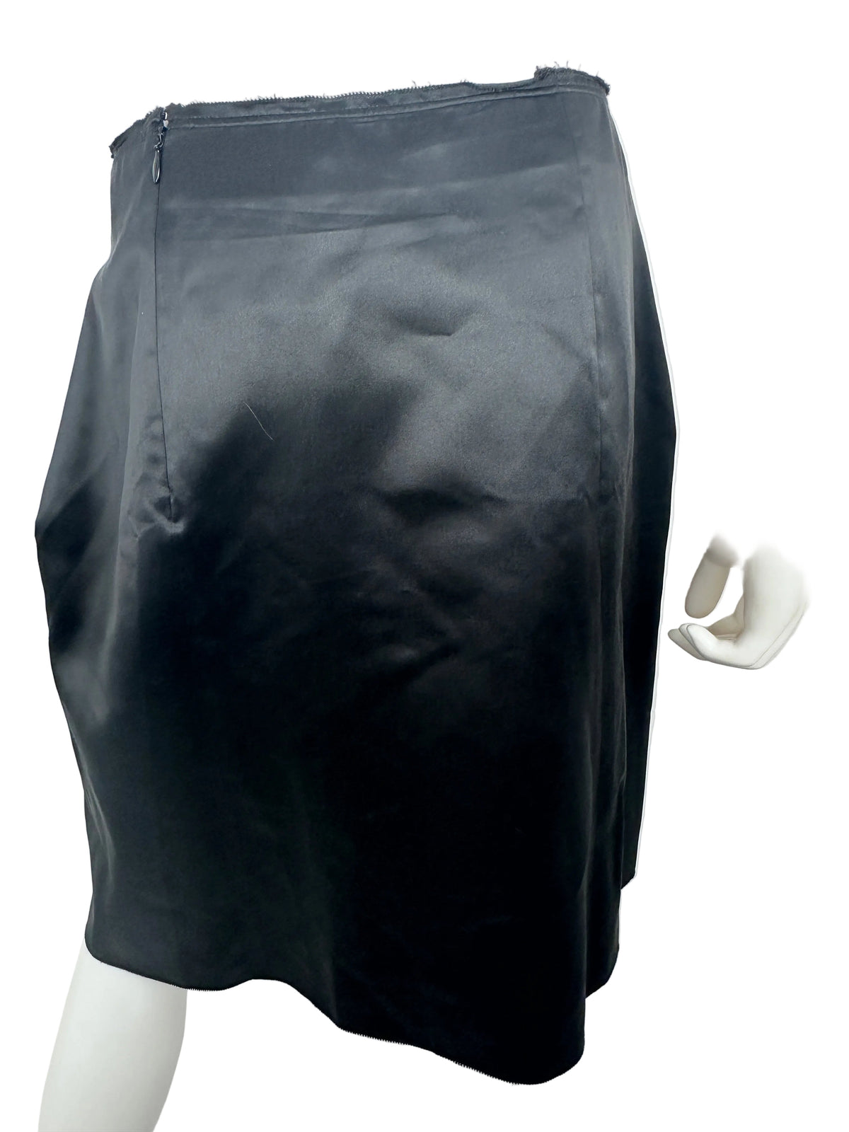 Black pants on a mannequin against a white background