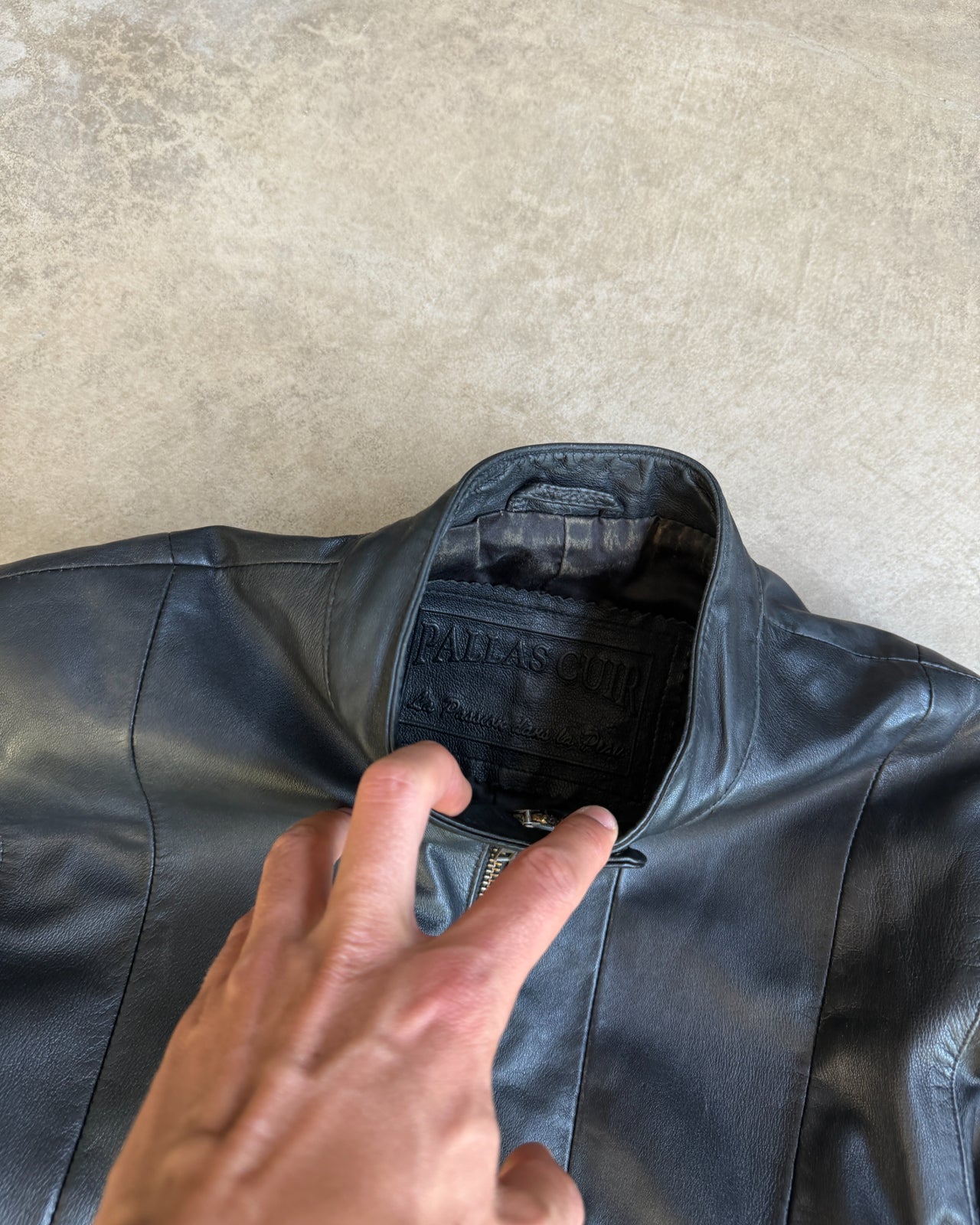 Pallas Cuir Boxy Black Leather Jacket – S/M-on a concrete background