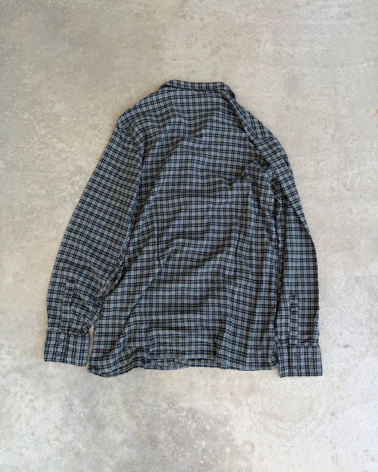 Armani Jeans Black and Grey Checked Long Sleeve Shirt – L/XL-on a concrete background