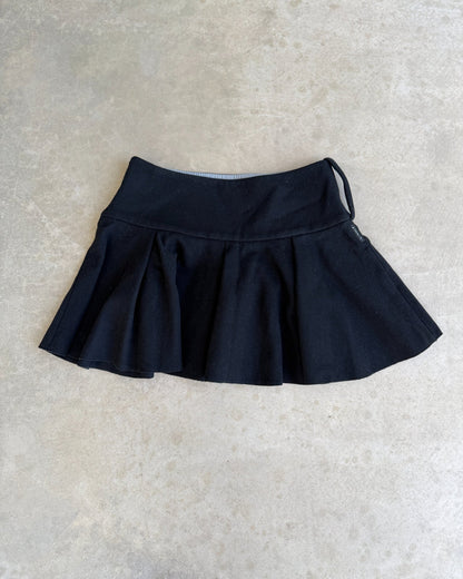 Armani Jeans Pleated Black Mini Skirt – S-on a concrete background