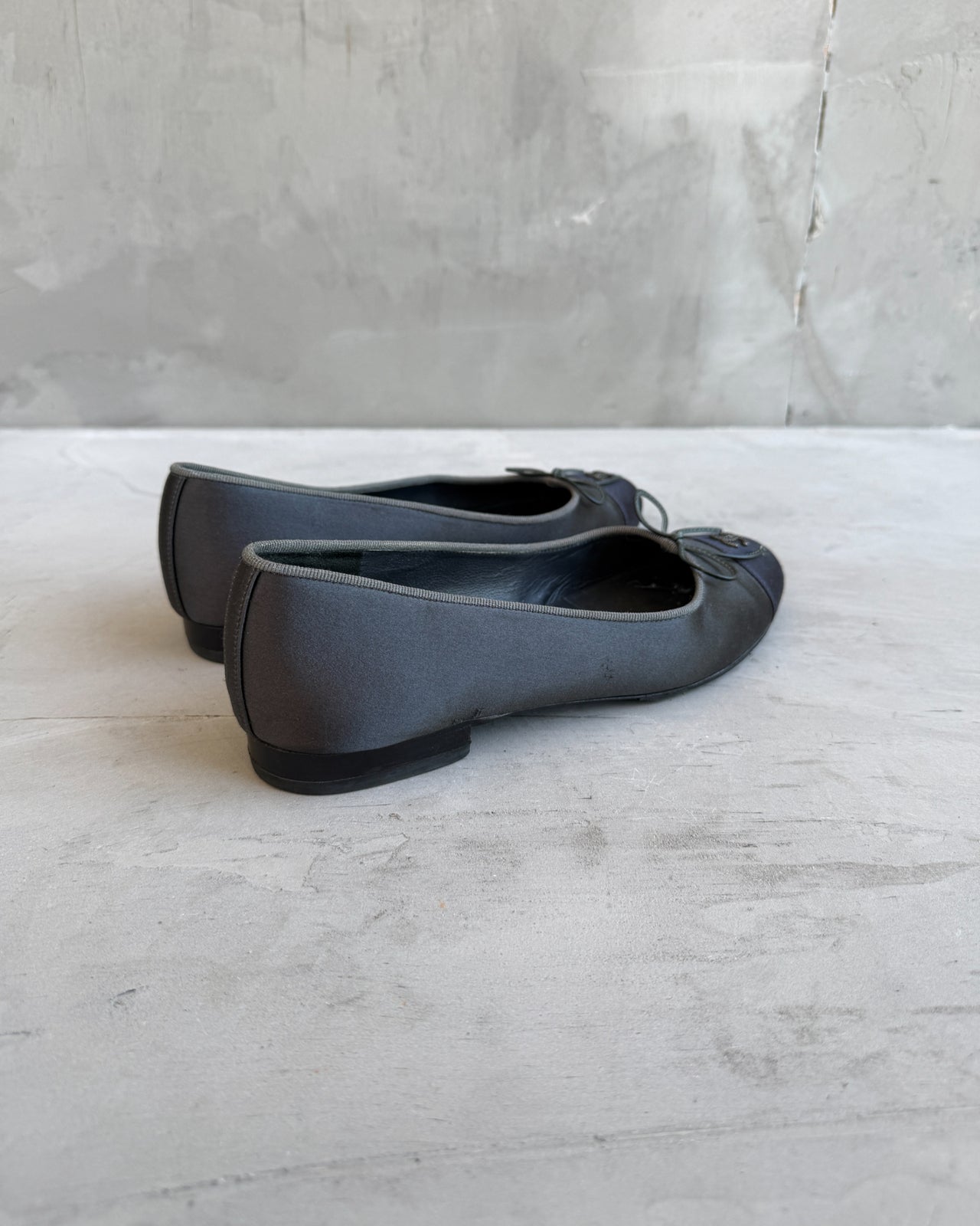 Chanel Silk Ballet Flat with Logo and Bow Detail – EU 36.5-on a concrete background