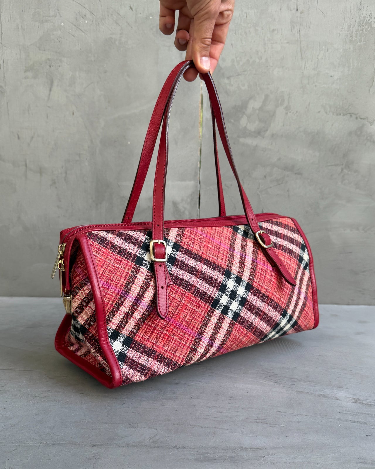 Burberry Blue Label Nova Print Red Bag-on a concrete background