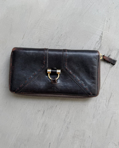 Yves Saint Laurent Leather Wallet-on a concrete background