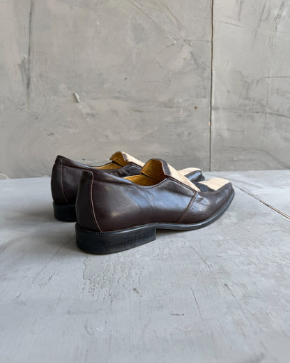Manock Zebra Skin Loafers – EU 43-on a concrete background