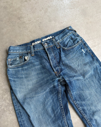Vintage Evisu Jeans – W30–31-on a concrete background