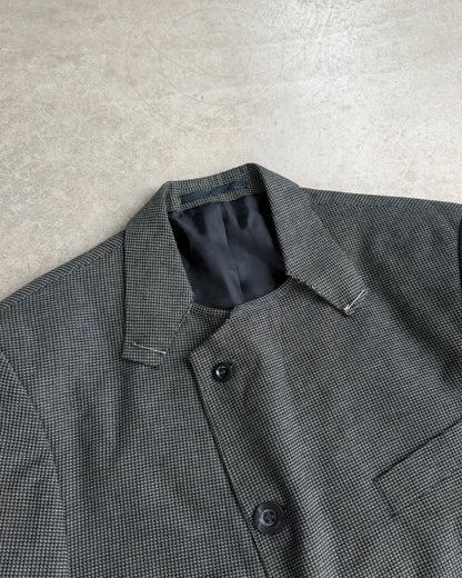 M Classic Altered Wool Jacket with Safety Pins – L-on a concrete background