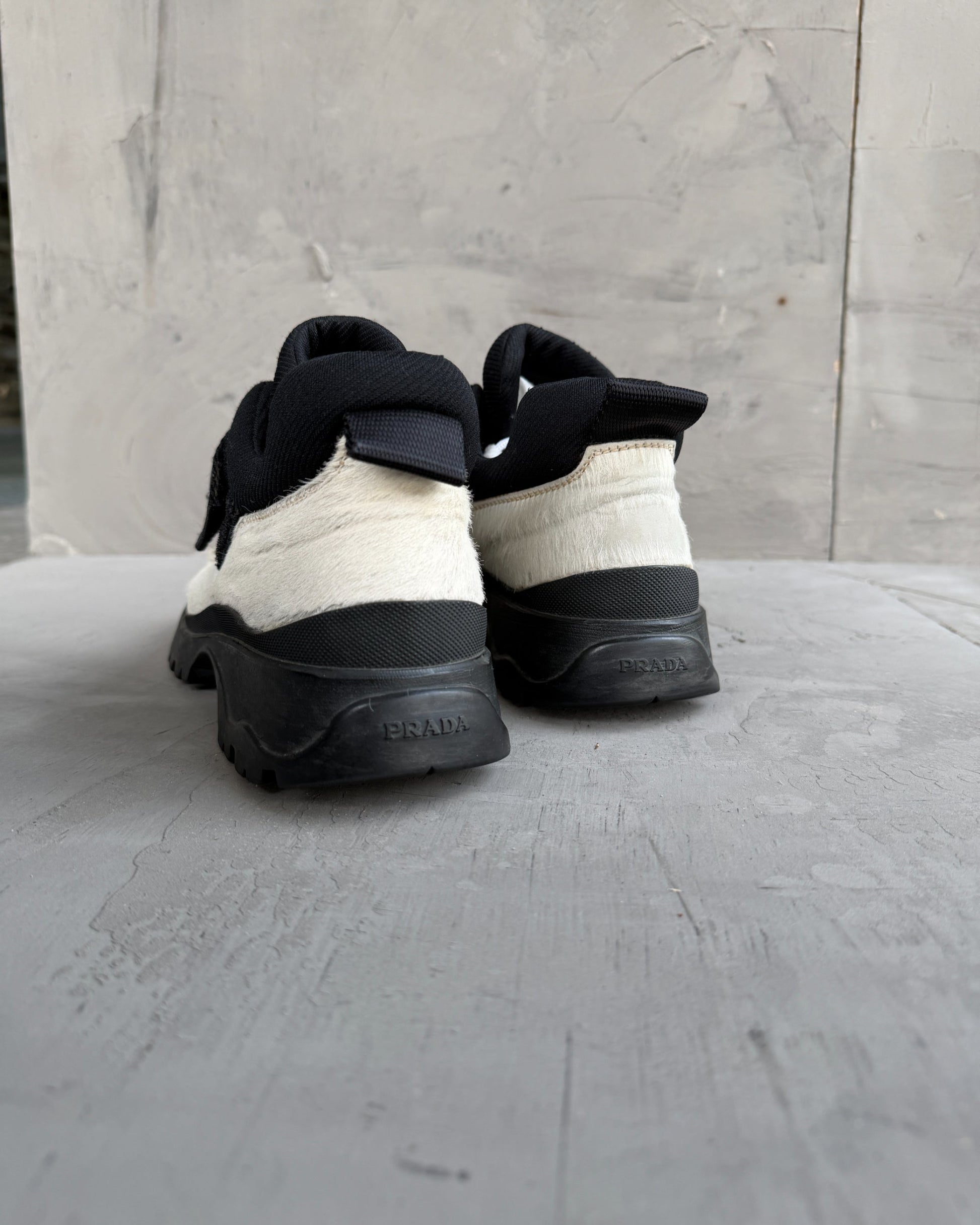 Prada FW99 Fur Vibram Heel Derbys – EU 38-on a concrete background