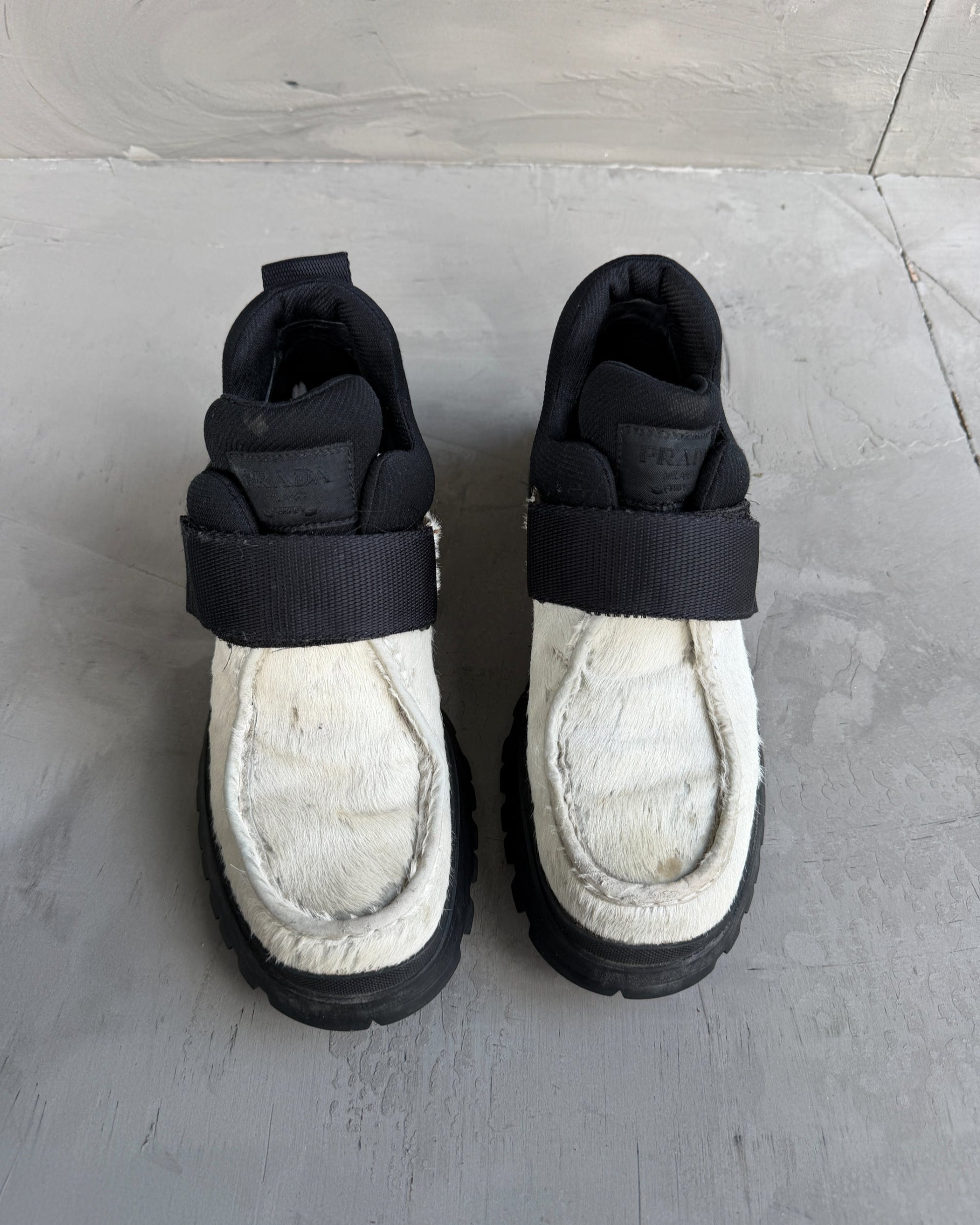 Prada FW99 Fur Vibram Heel Derbys – EU 38-on a concrete background