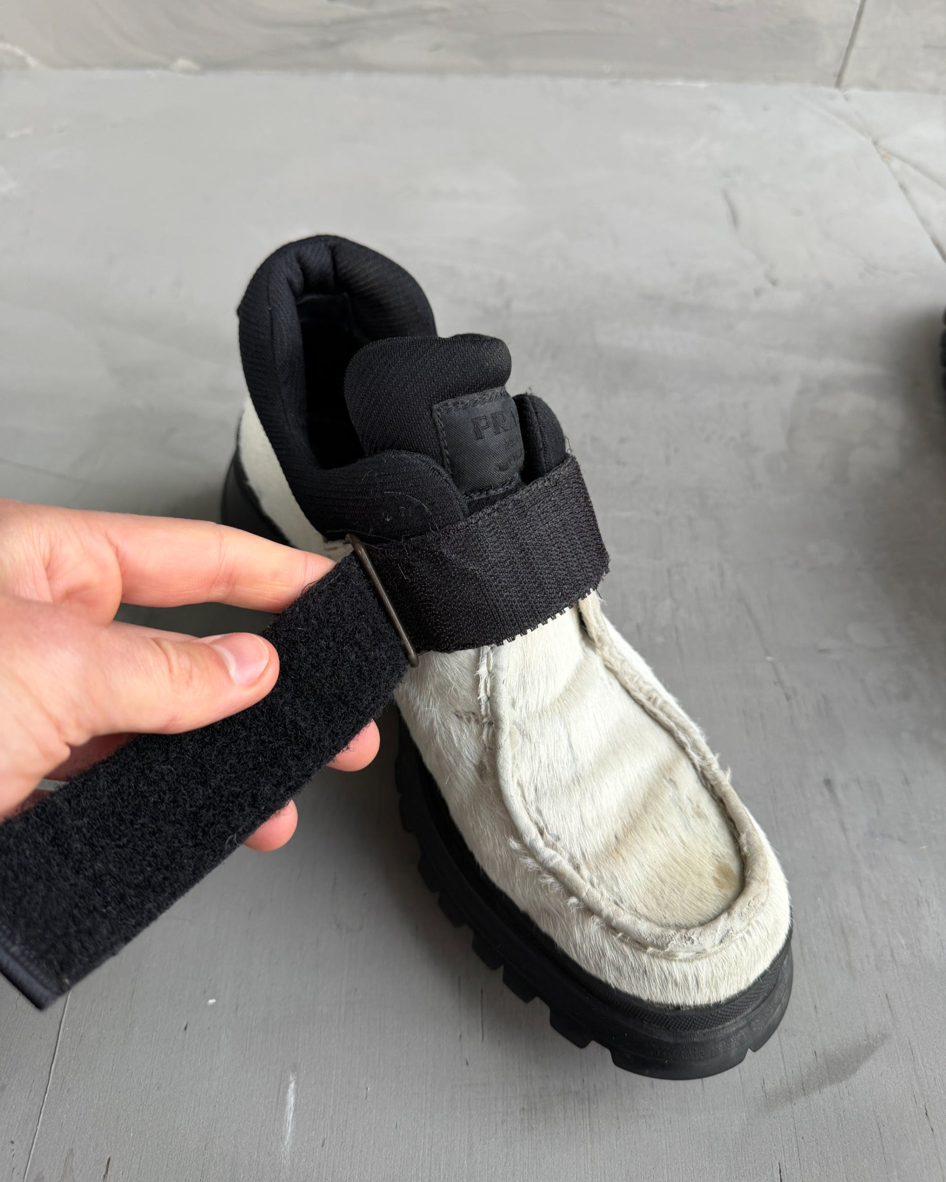 Prada FW99 Fur Vibram Heel Derbys – EU 38-on a concrete background