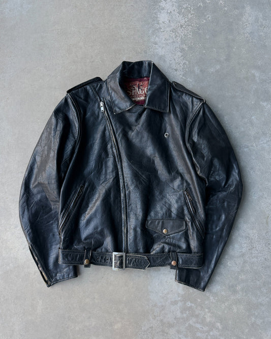 1960s Staggs Leather Moto Jacket – S-on a concrete background