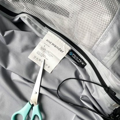 And Wander Pertex Shield Rain Jacket (L)