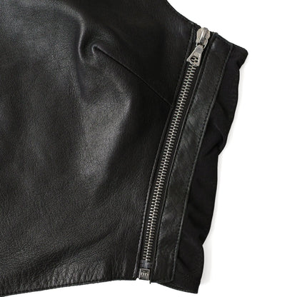 Plein Sud 2000s leather crop top with mesh side panels and zipper details. Size S/M. Available at Artefact Archive.
