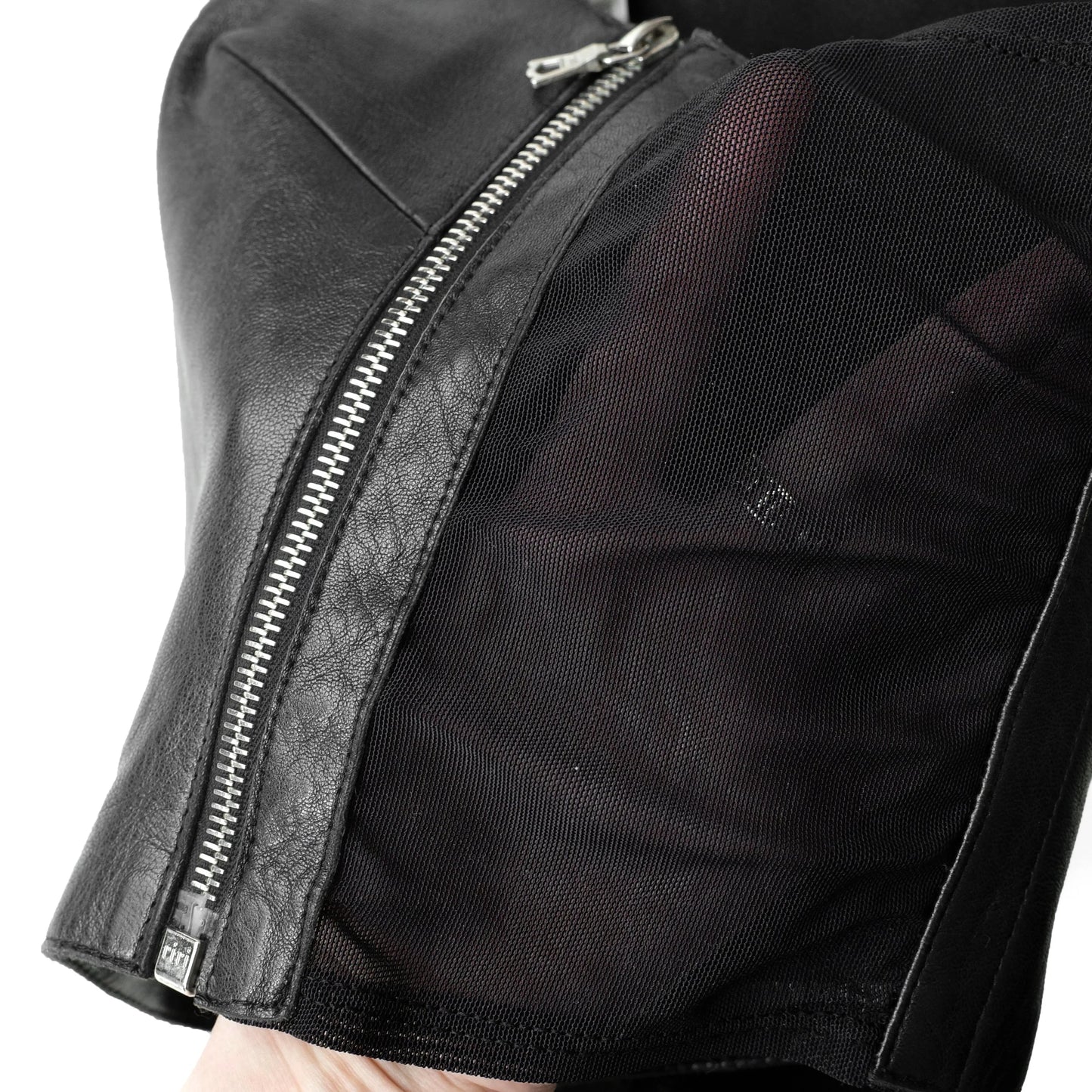Plein Sud 2000s leather crop top with mesh side panels and zipper details. Size S/M. Available at Artefact Archive.