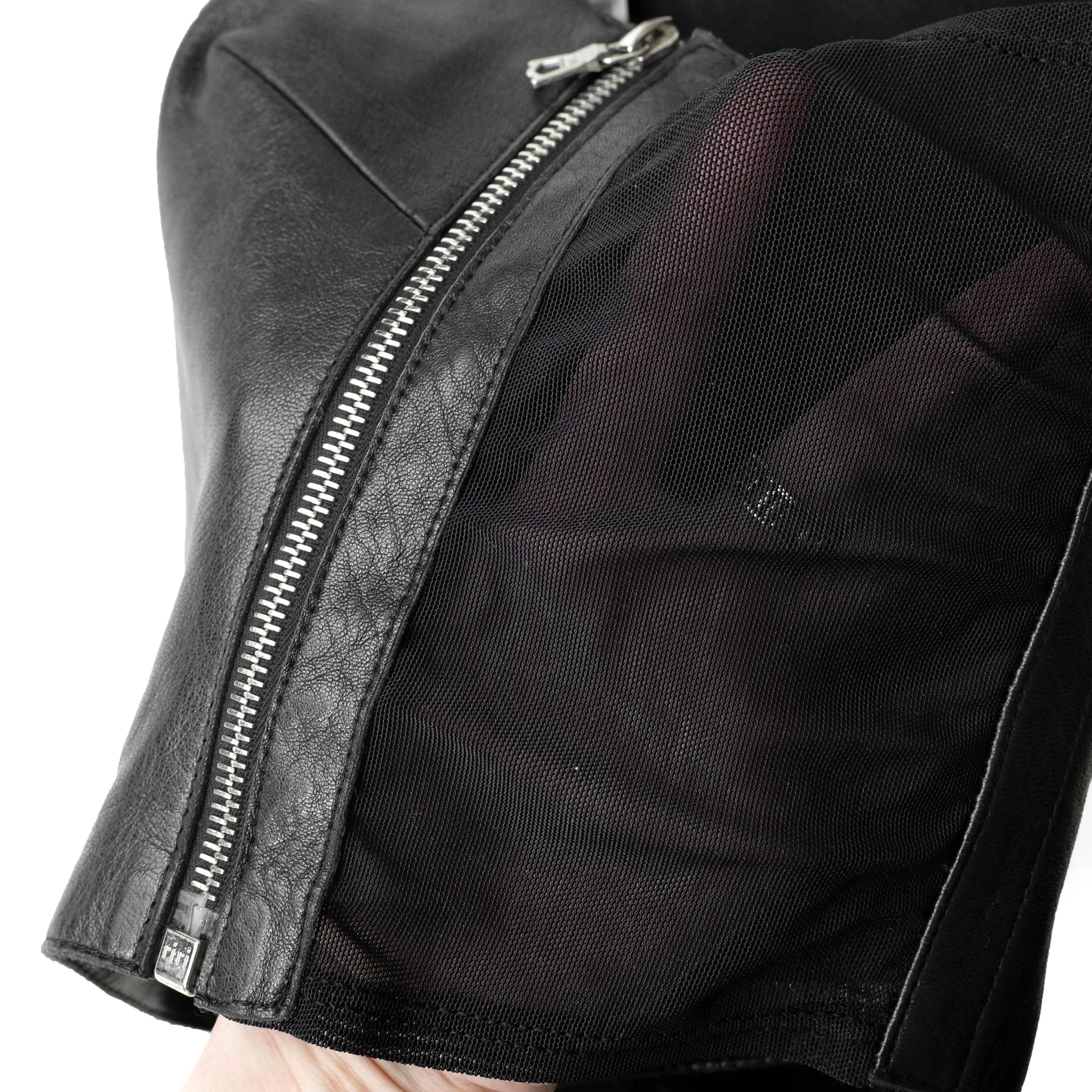 Plein Sud 2000s leather crop top with mesh side panels and zipper details. Size S/M. Available at Artefact Archive.