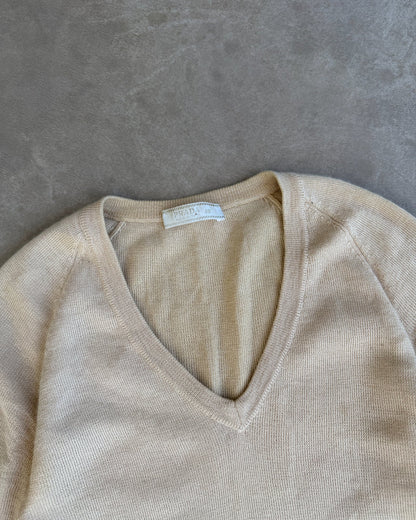 Prada Cashmere Silk Blend V Neck T-Shirt – S-on a concrete background
