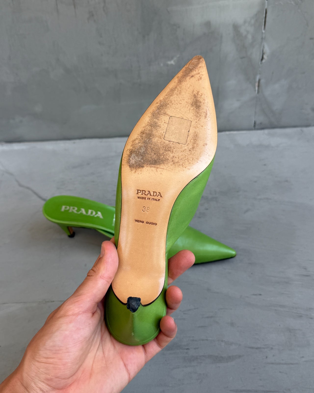 Prada Green Leather Kitten Heel Mule – EU 38-on a concrete background