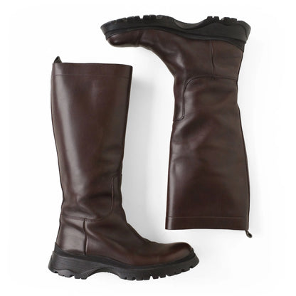 https://images.squarespace-cdn.com/content/v1/673cad159307f210013ba2f7/7302700d-af9d-4016-ace6-2558ed6c7d2d/Prada_2000s_BrownLeatherLugSoleBoots39_1.jpg