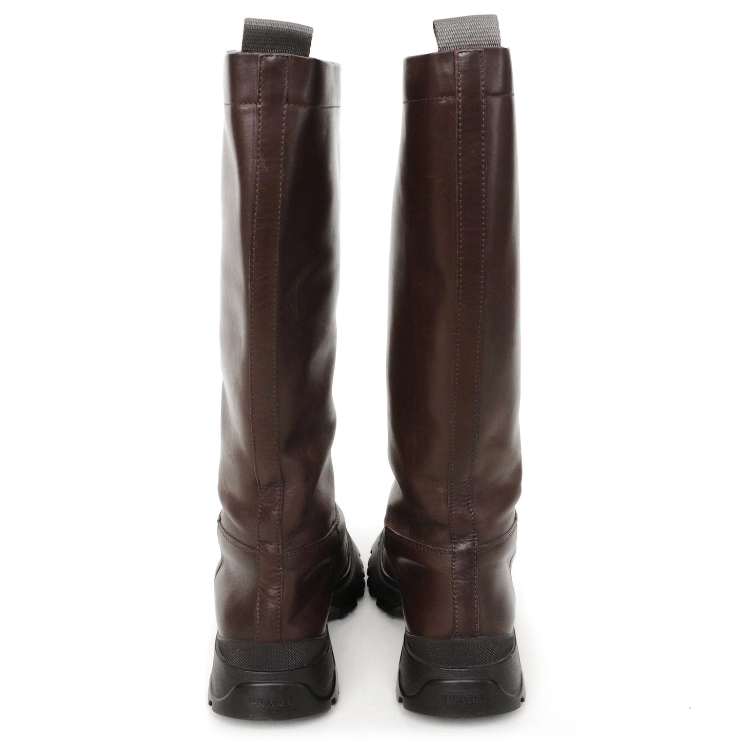 https://images.squarespace-cdn.com/content/v1/673cad159307f210013ba2f7/48b7cdf8-fa2c-463b-b855-32a356bc9207/Prada_2000s_BrownLeatherLugSoleBoots39_5.jpg