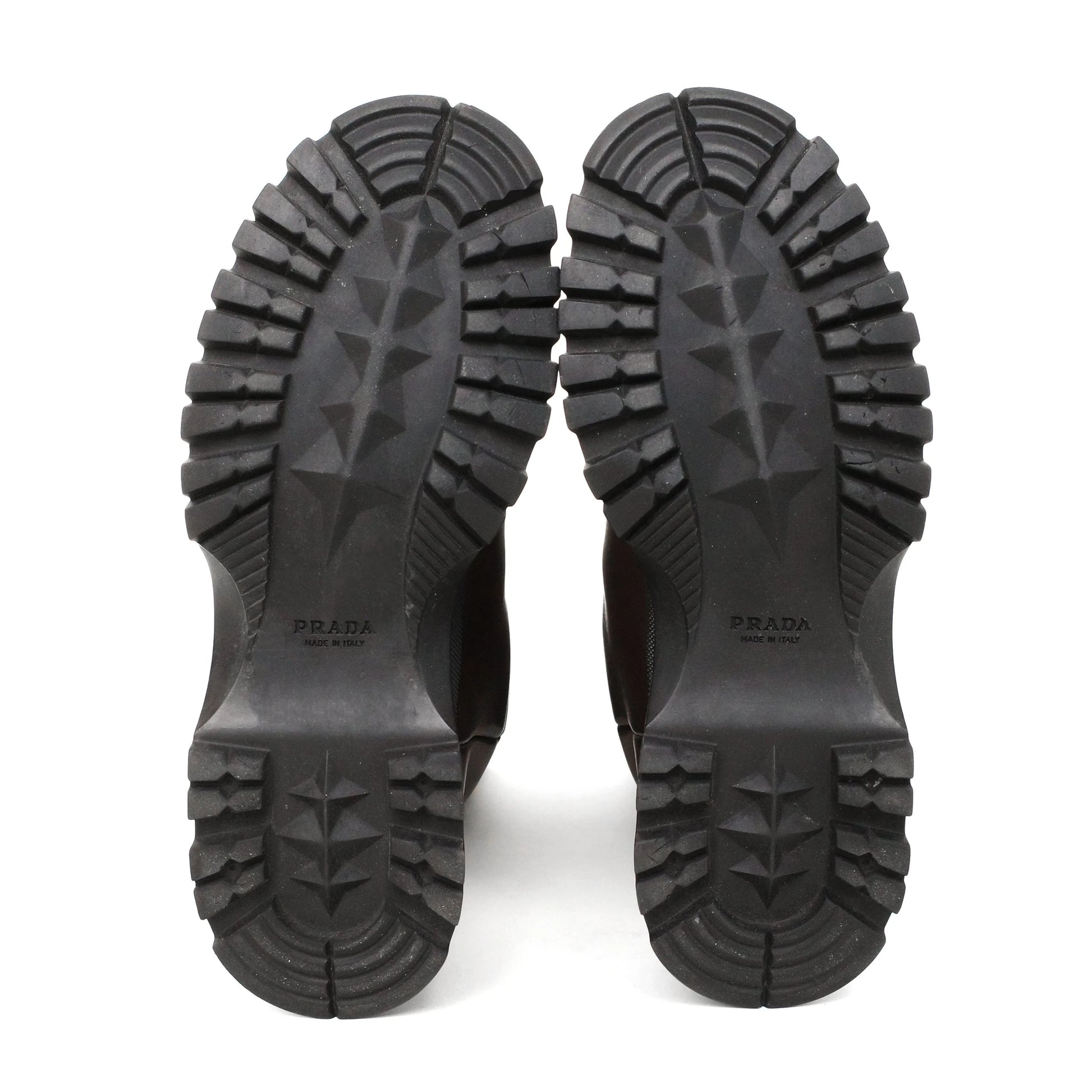 https://images.squarespace-cdn.com/content/v1/673cad159307f210013ba2f7/fc62637d-14fc-4fba-971c-3b78b1147689/Prada_2000s_BrownLeatherLugSoleBoots39_7.jpg