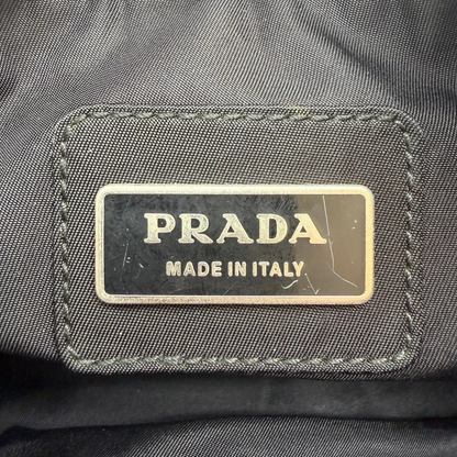 https://cdn.shopify.com/s/files/1/0564/9376/8855/files/Prada_Bauchtasche___Gurteltasche_aus_Nylon_schwarz_vintage7783.webp?v=1780487355
