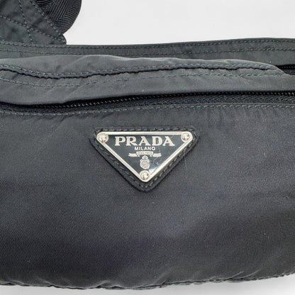 https://cdn.shopify.com/s/files/1/0564/9376/8855/files/Prada_Bauchtasche_aus_Nylon_schwarz_vintage_bum_bag4592.webp?v=1760051867