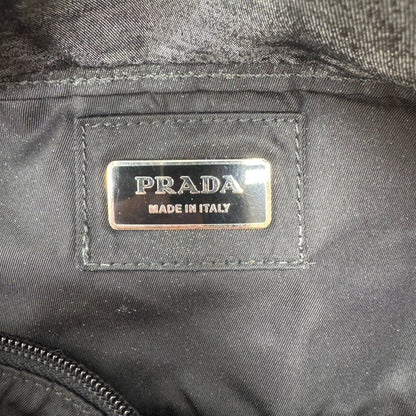 https://cdn.shopify.com/s/files/1/0564/9376/8855/files/Prada_Bauchtasche_aus_Nylon_schwarz_vintage_bum_bag4594.webp?v=1760051867