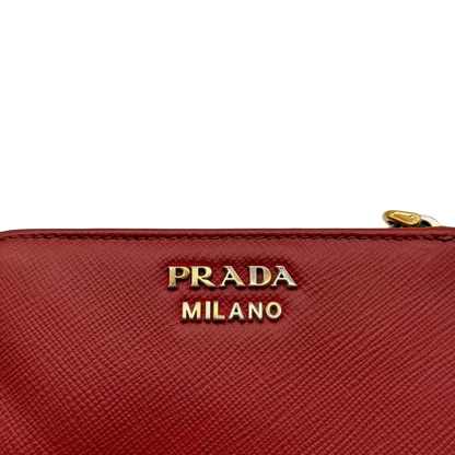 https://cdn.shopify.com/s/files/1/0564/9376/8855/files/Prada_Geldbeutel_Zip_auf_Saffiano_Leder_rot_20.webp?v=1784243609