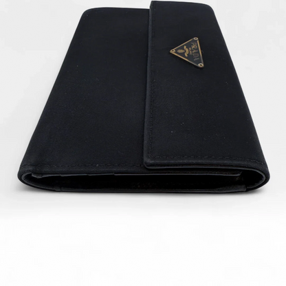 https://cdn.shopify.com/s/files/1/0564/9376/8855/files/Prada_Geldbeutel_aus_Nylon_schwarz_vintage_wallet9779.webp?v=1758649691