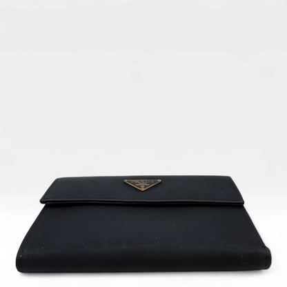 https://cdn.shopify.com/s/files/1/0564/9376/8855/files/Prada_Geldbeutel_aus_Nylon_schwarz_vintage_wallet9781.webp?v=1758649691