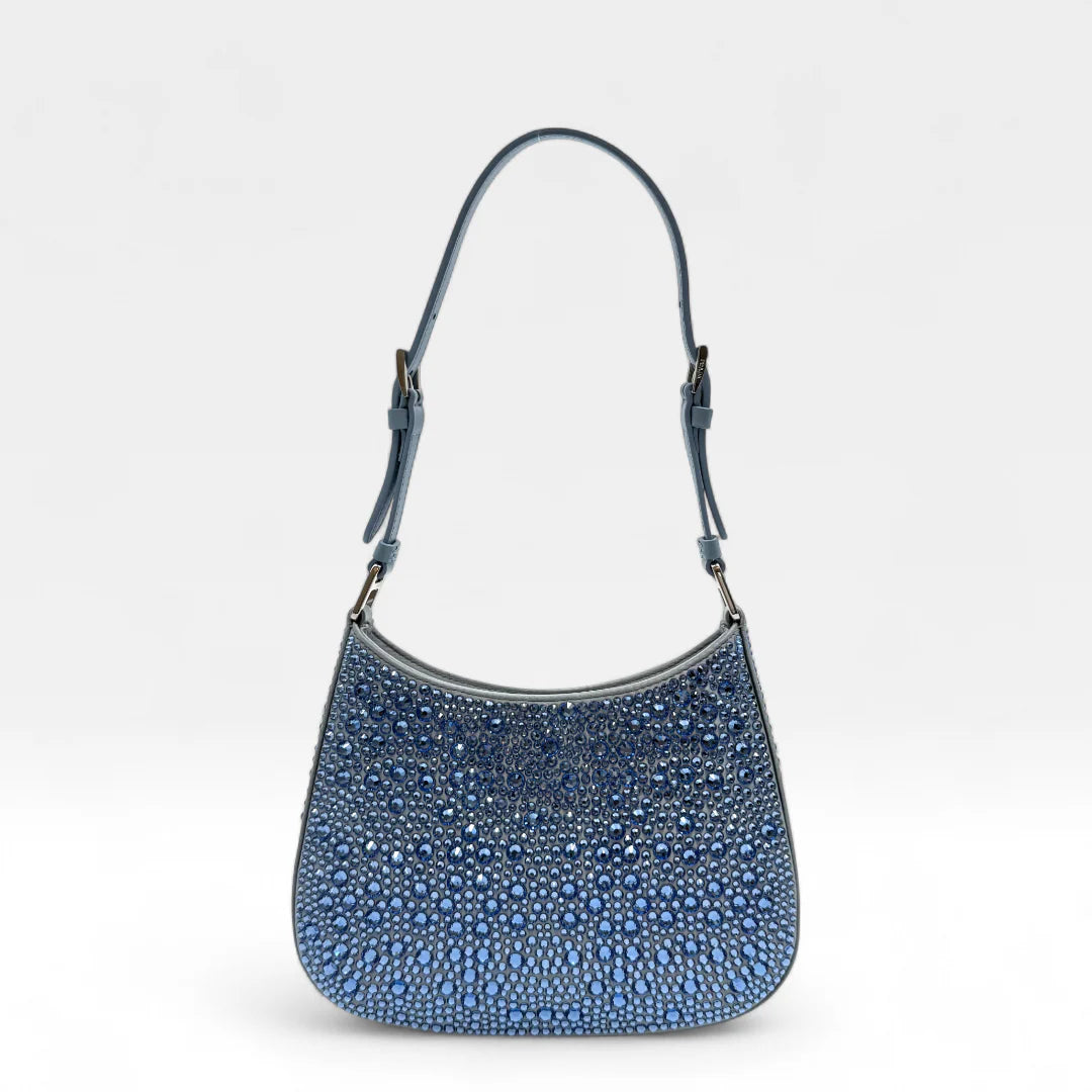 https://cdn.shopify.com/s/files/1/0564/9376/8855/files/Prada_Handtasche_Cleo_Kristall_aus_Nylon_hellblau_handbag5070_689f5855-2cb5-44ca-8b08-44c3f2b4b5c1.webp?v=1761263519