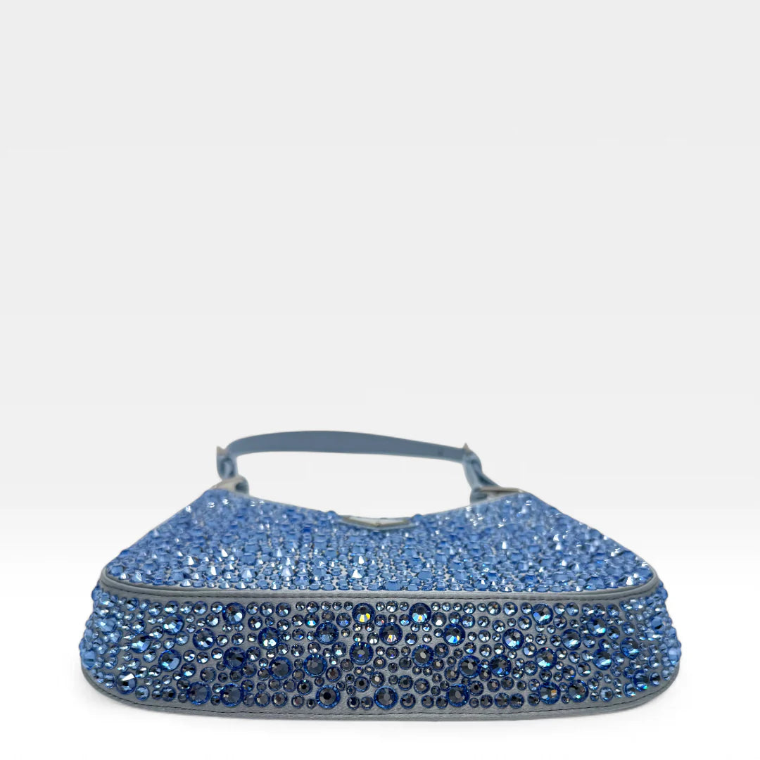 https://cdn.shopify.com/s/files/1/0564/9376/8855/files/Prada_Handtasche_Cleo_Kristall_aus_Nylon_hellblau_handbag5071_adaf565a-6ad1-4bcd-acb0-57969018e160.webp?v=1761263457