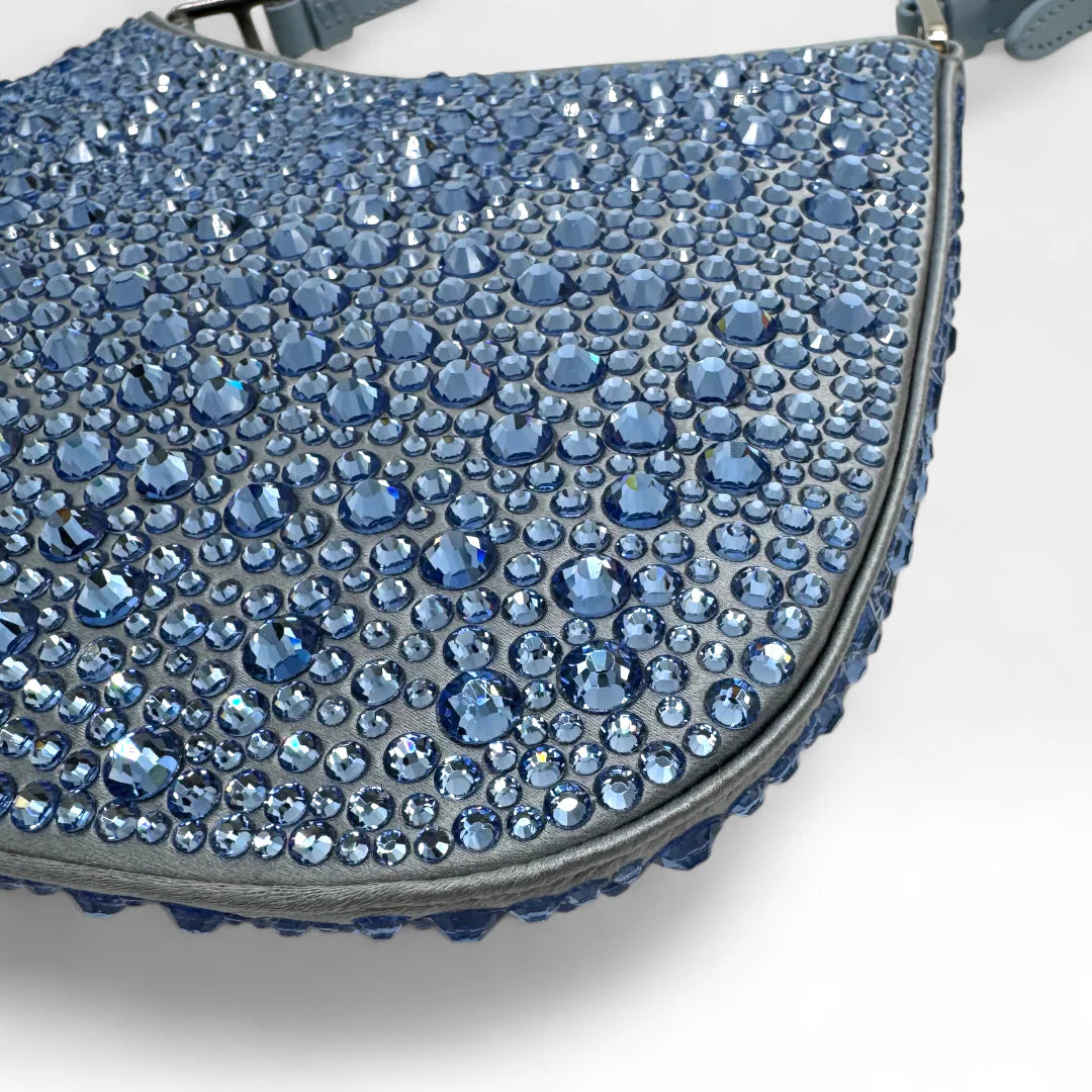 https://cdn.shopify.com/s/files/1/0564/9376/8855/files/Prada_Handtasche_Cleo_Kristall_aus_Nylon_hellblau_handbag5075_14fe85eb-ba3c-4c33-8fe7-59d25d1a9731.webp?v=1761263458