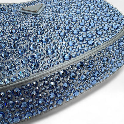 https://cdn.shopify.com/s/files/1/0564/9376/8855/files/Prada_Handtasche_Cleo_Kristall_aus_Nylon_hellblau_handbag5081_d4b0f429-73fd-47ed-ad07-17dd23890145.webp?v=1761263458