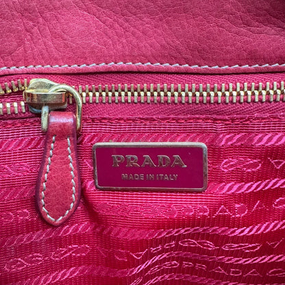 https://cdn.shopify.com/s/files/1/0564/9376/8855/files/Prada_Handtasche_Pocono_aus_Nylon_pink_second_hand_designer_handbag3400.webp?v=1757505483