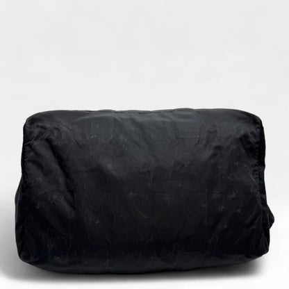 https://cdn.shopify.com/s/files/1/0564/9376/8855/files/Prada_Reisetasche_50_aus_Nylon_schwarz_vintage_dufflebag5152.webp?v=1761262441