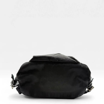 https://cdn.shopify.com/s/files/1/0564/9376/8855/files/Prada_Rucksack_mit_Schnalle_aus_Nylon_schwarz_second_hand_designer_backpack3160.webp?v=1753348225