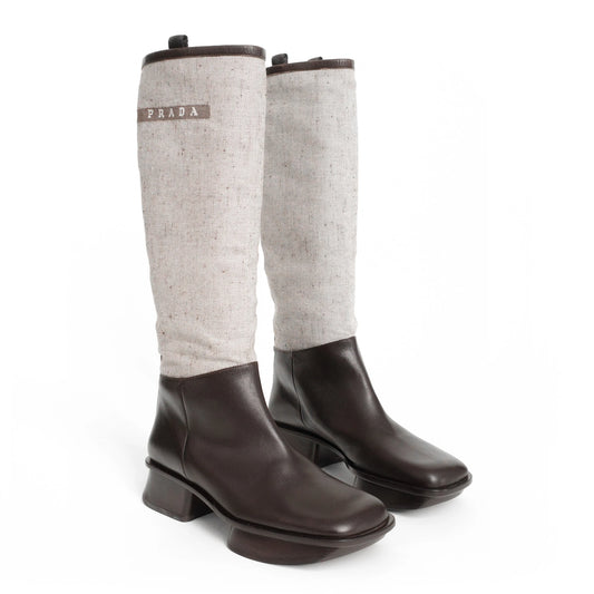 https://images.squarespace-cdn.com/content/v1/673cad159307f210013ba2f7/b4d5be74-29da-4b71-84f0-b19a28540777/Prada_SS1999_CanvasSplitSoleBoots_1.jpg