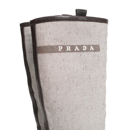 Prada SS 1999 split sole knee boots composed of canvas and leather. Size EU 37 / UK 4. Available at Artefact Archive.