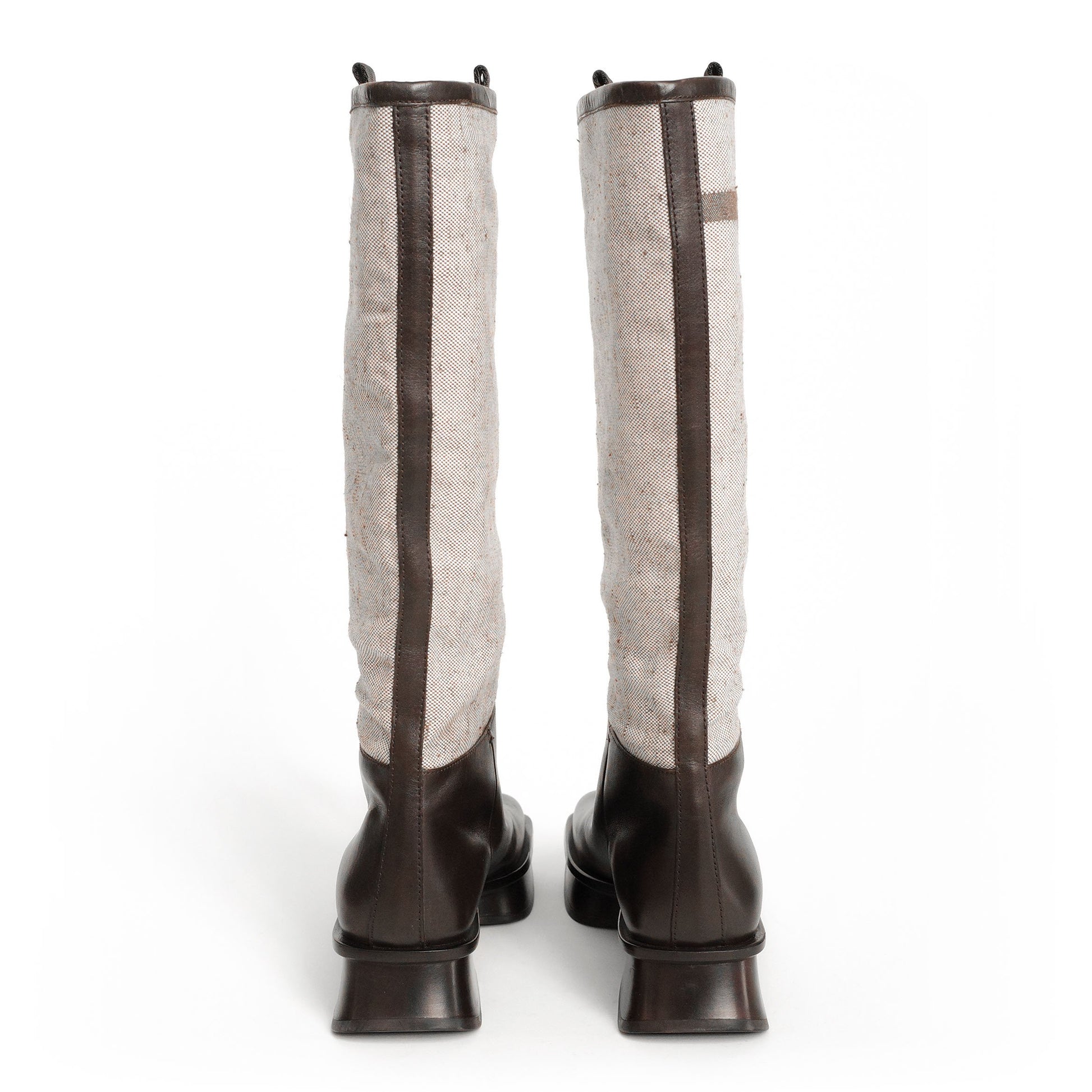 Prada SS 1999 split sole knee boots composed of canvas and leather. Size EU 37 / UK 4. Available at Artefact Archive.