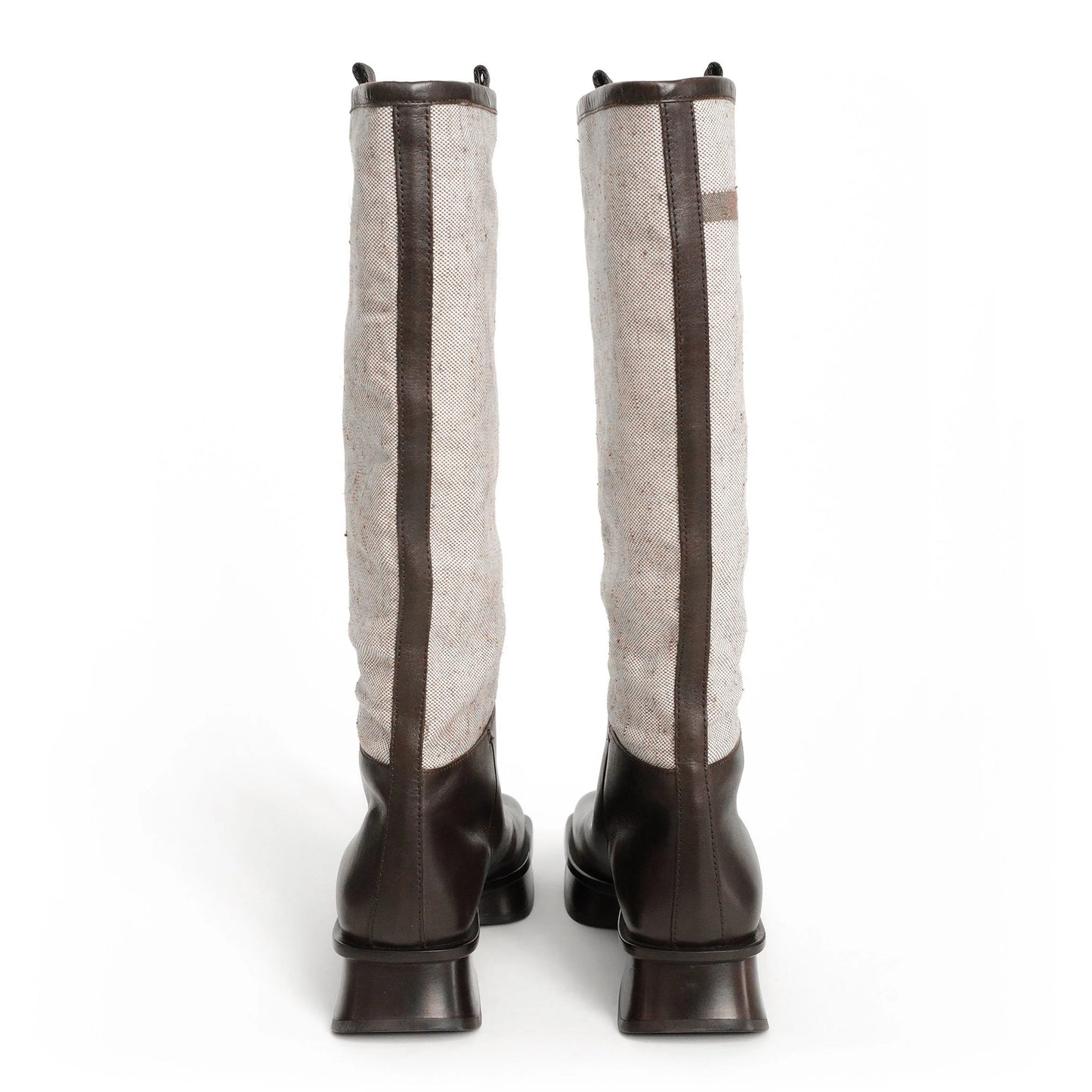 https://images.squarespace-cdn.com/content/v1/673cad159307f210013ba2f7/835ba6c3-b514-488a-a43c-dcd6f356a767/Prada_SS1999_CanvasSplitSoleBoots_5.jpg