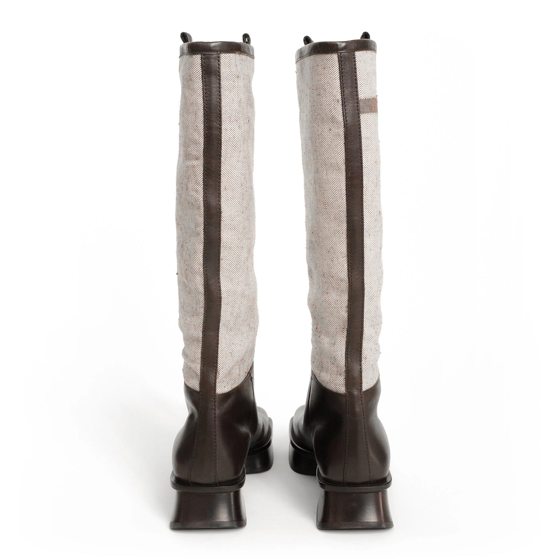 https://images.squarespace-cdn.com/content/v1/673cad159307f210013ba2f7/835ba6c3-b514-488a-a43c-dcd6f356a767/Prada_SS1999_CanvasSplitSoleBoots_5.jpg