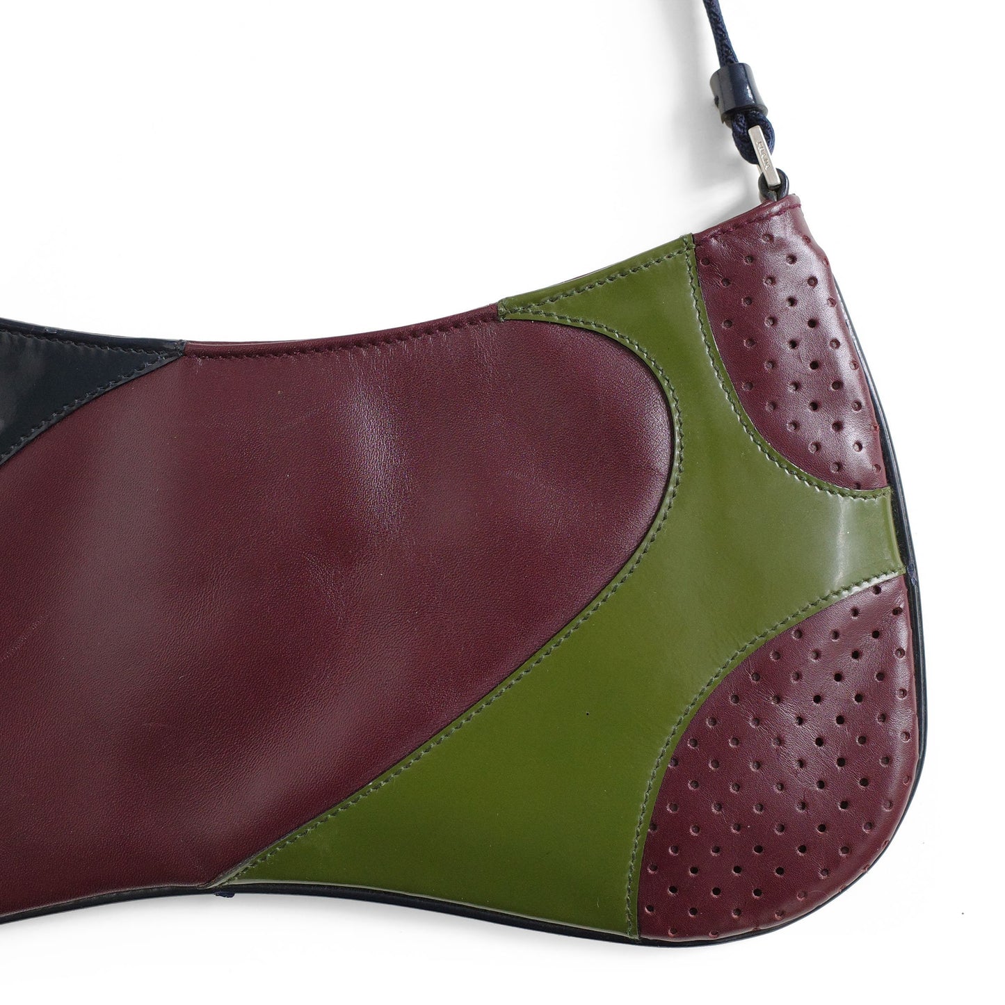 Prada SS 2000 Vitello Drive shoulder bag in burgundy leather with navy and green patent leather panels and perforated leather sections. Available at Artefact Archive.
