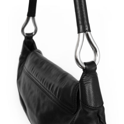 Prada SS 2003 shoulder bag in black Nappa leather with metal hoop strap details. Available at Artefact Archive.