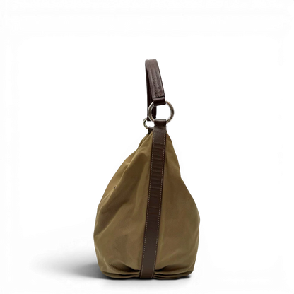 https://cdn.shopify.com/s/files/1/0564/9376/8855/files/Prada_Schultertasche_Hobo_Croissant_aus_Nylon_beige_vintage7735.webp?v=1780487479