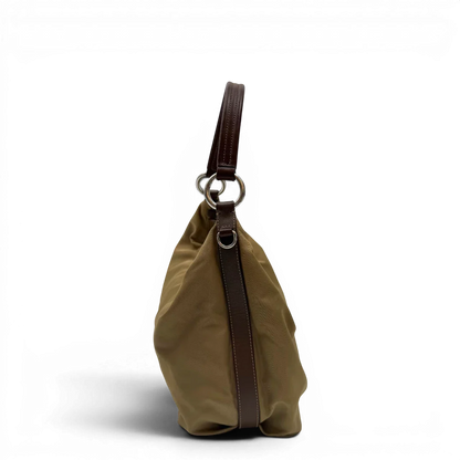 https://cdn.shopify.com/s/files/1/0564/9376/8855/files/Prada_Schultertasche_Hobo_Croissant_aus_Nylon_beige_vintage7736.webp?v=1780487479
