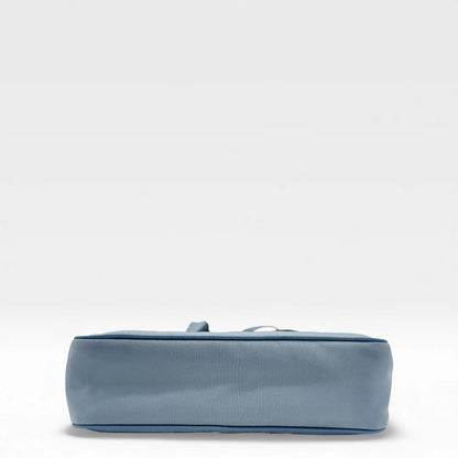 https://cdn.shopify.com/s/files/1/0564/9376/8855/files/Prada_Umhangetasche_Tessuto_Re-Nylon_2005_hellblau_crossbody_5831.webp?v=1765453661