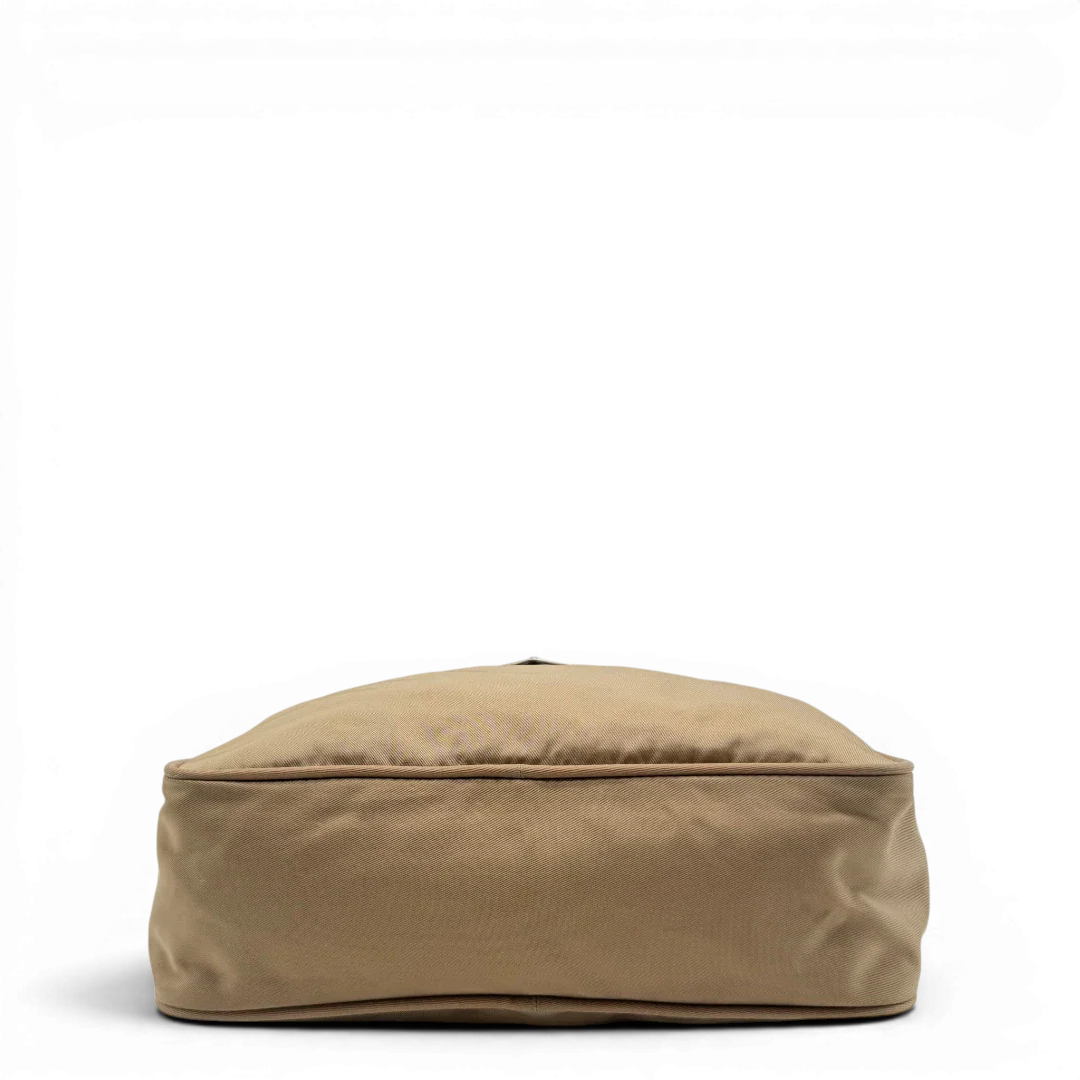 https://cdn.shopify.com/s/files/1/0564/9376/8855/files/Prada_Umhangetasche_rechteckig_small_aus_Nylon_hellbraun_5.webp?v=1782311804